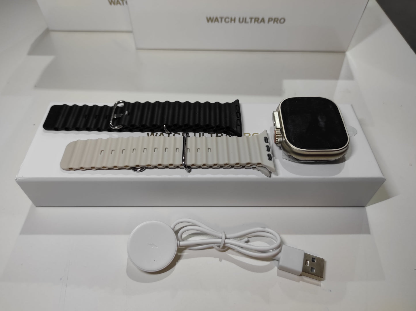 A- Smartwatch Ultra Pro con 2 correas